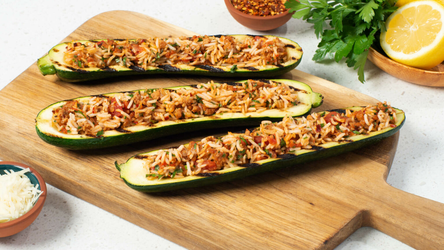 Zucchini Boats Stuffed with Rice and Sausage
